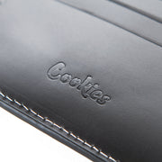Cookies Leather Monogram Embossed Billfold Wallet in black, fourth view