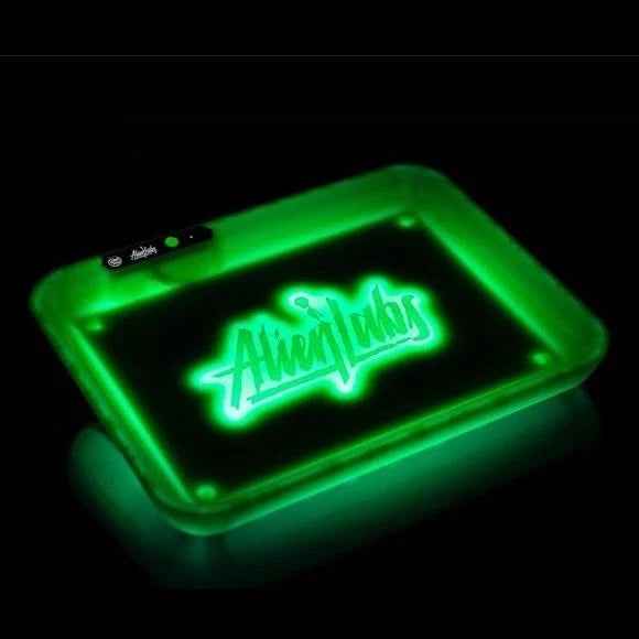 Glow Tray x Alien Labs LED rolling tray lit up green