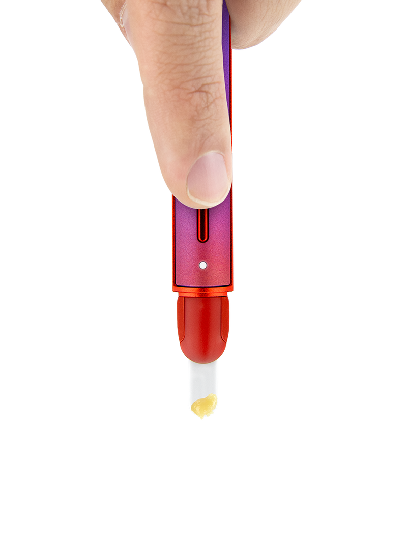 Puffco Hot Knife Plasma limited edition held in hand loading concentrate